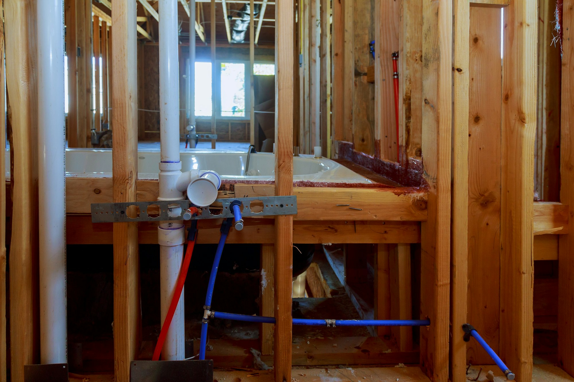Bathroom unfinishing new home installation of plumbing, faucets, water and sewerage.